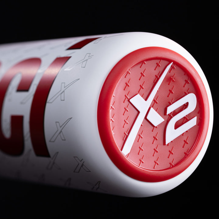 Close-up of the end cap on the 2025 Marucci CATX2 (-3) BBCOR Baseball Bat (MCBCX2), showing its raised X2 design, diagonal line background, and advanced anti-vibration technology.