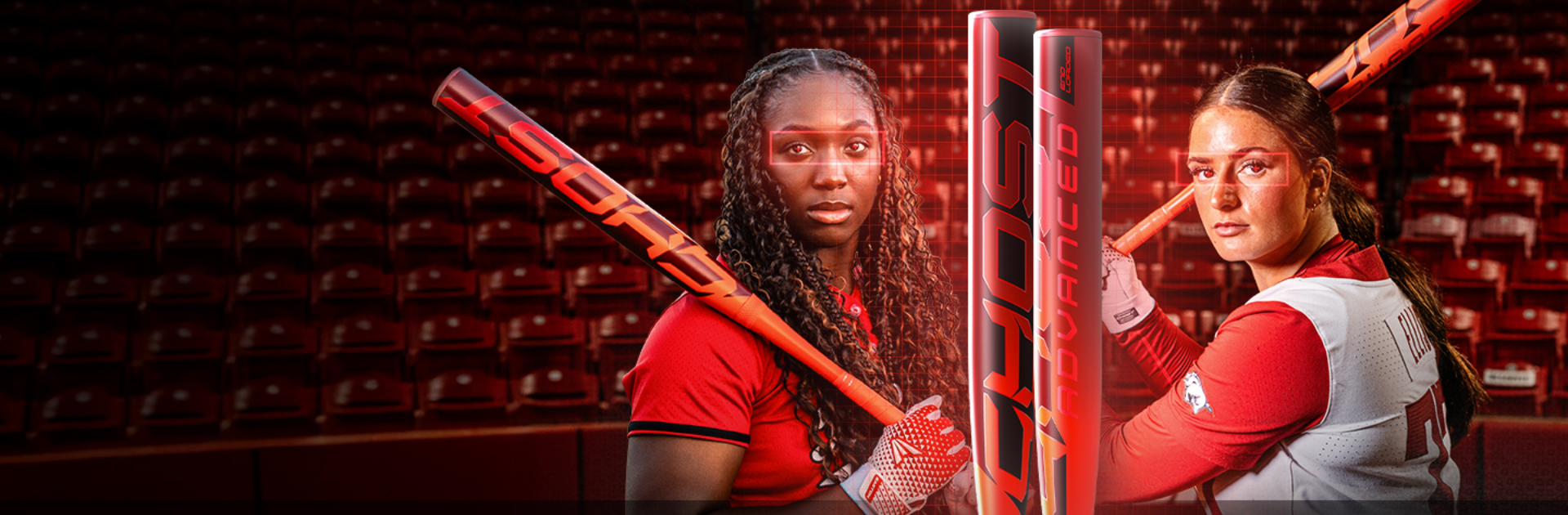 Two female softball players in red uniforms holding orange bats stand in a stadium with empty red seats, looking intensely at the camera. Two close-up images of the same orange bat are prominently displayed in the foreground.