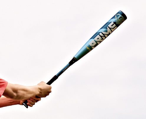 A person holds the 2025 Louisville Slugger Meta Prime (-8) 2 3/4" USSSA Baseball Bat (WBL2971010 DEMO) with both hands against a plain background, highlighting the bold "PRIME" branding on this standout Louisville Slugger bat.