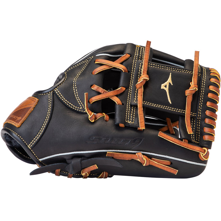 A Mizuno Select 9 11.25" Baseball Glove (GSN1125), black with brown laces and yellow stitching, made from Bio Soft Leather and featuring a gold Mizuno logo on the back, is shown closed from the side.