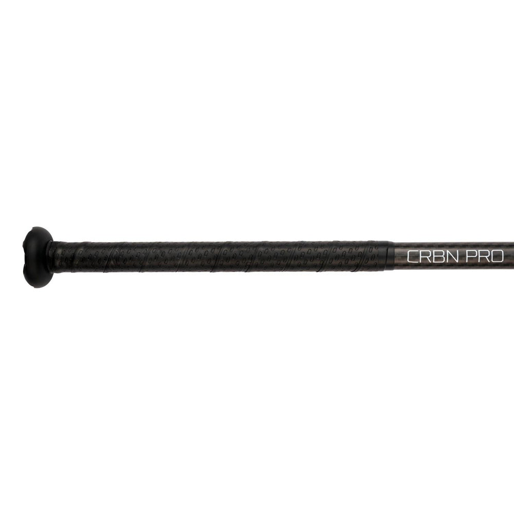 Close-up of the black handle of the 2025 Mizuno CRBN Pro (-10) Fastpitch Softball Bat (model 340665), featuring a textured grip, Double Wall Detonator COR technology, and "CRBN PRO" printed near the barrel.