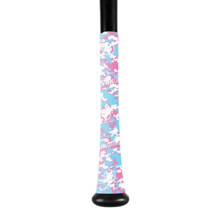 A VukGripz Bat Grip Tape by VukGripz is wrapped around a baseball bat handle, showcasing pink, blue, and white camouflage for optimal grip. The tape features the UKGRIP logo on a plain white background.