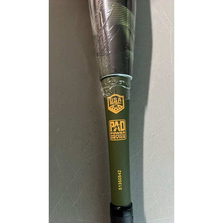 A close-up of a green 2025 Pure Hellfire X22 13″ Endload USA Slowpitch Softball Bat (model 5135M565) by Pure Sports, featuring the “USA Bat” label and serial 51950542 on the handle, photographed on a gray surface.