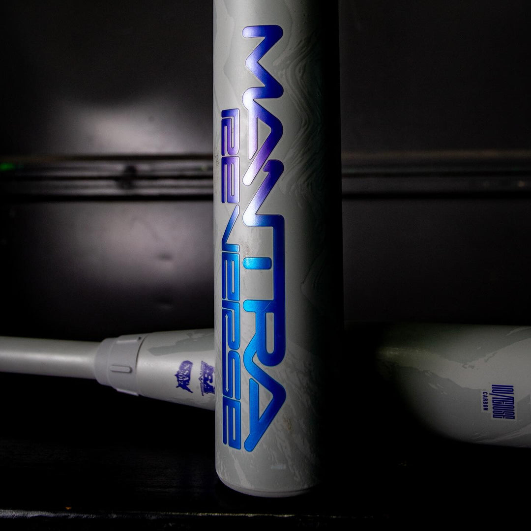 A close-up highlights the advanced barrel technology of the 2025 Rawlings Mantra Reverse (-11) Fastpitch Softball Bat: RFP5MR11 (DEMO).