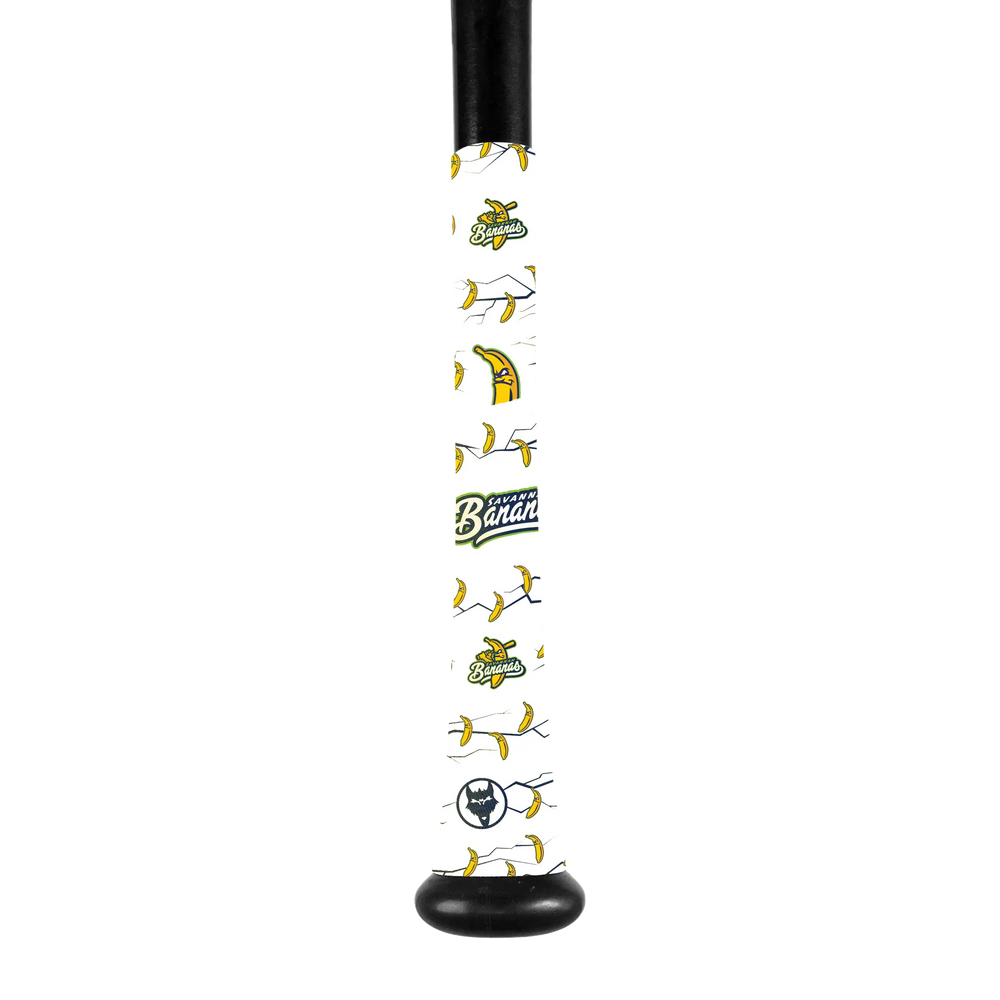 A close-up of a VukGripz Bat Grip Tape by VukGripz featuring cartoon bananas, a Banana Ball logo, and a small circular emblem at the end for optimum grip.