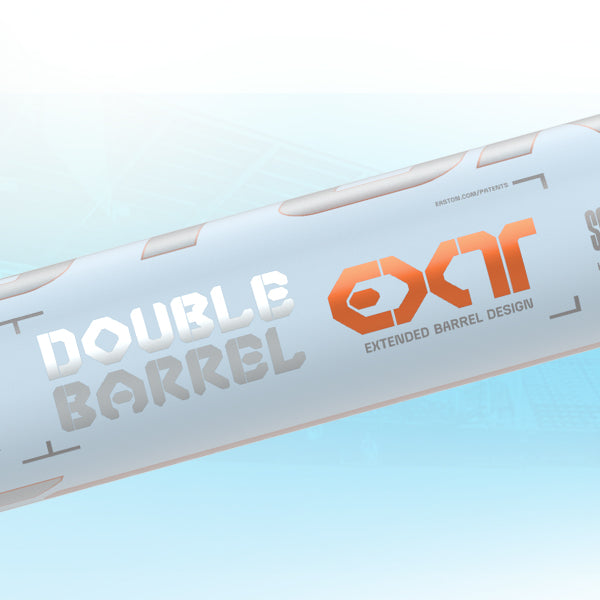 Close-up of a white baseball bat with “DOUBLE BARREL” in silver stenciled letters and “EXT” in bold orange letters, alongside the phrase “EXTENDED BARREL DESIGN” on the barrel.
