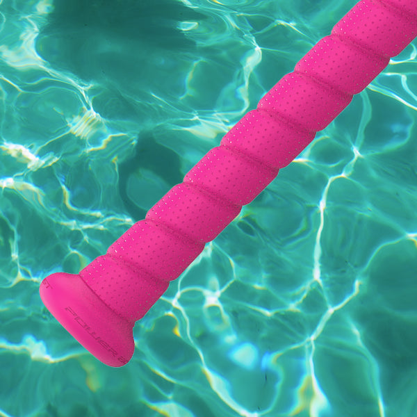 A 2025 Easton Hype Fire Pool Party (-5) USSSA Baseball Bat with a bright pink handle is shown diagonally over shimmering turquoise pool water.