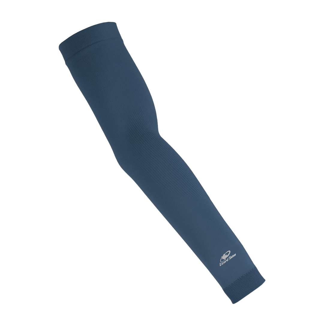 The Lizard Skins Knit Arm Sleeve: ARMK is a navy compression sleeve with a subtle textured pattern and a small white logo near the wrist, designed for muscle support, shown against a plain white background.