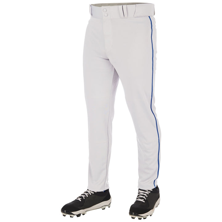 A person wearing Champro Sports Adult Triple Crown 2.0 Tapered Baseball Pants with blue piping (BP66) and black cleats, shown from the waist down against a plain background.