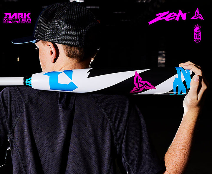 A person in a dark shirt holds a 2025 DeMarini ZEN (-8) 2 3/4" USSSA Baseball Bat (WBD2533010) over their shoulder in a dimly lit setting, with "ZEN" and "Dark Matter Composite" text displayed in the corners.