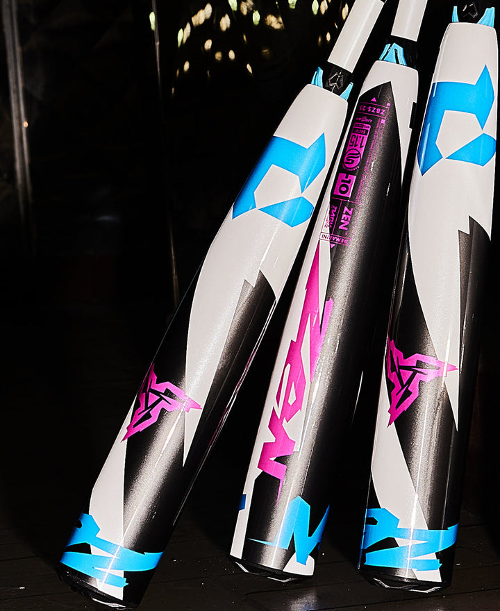 A selection of USSSA baseball bats, including the 2025 DeMarini ZEN (-10) 2 3/4" (USED), ideal for strengthening any lineup.