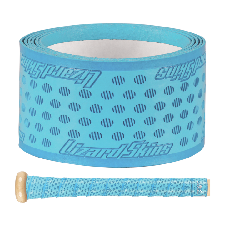 A roll of Lizard Skins DSP Ultra Solid 1.1mm Bat Grip in bright blue, featuring diagonal cutouts and logo, shown next to a baseball bat handle wrapped in the same stylish Lizard Skins grip.