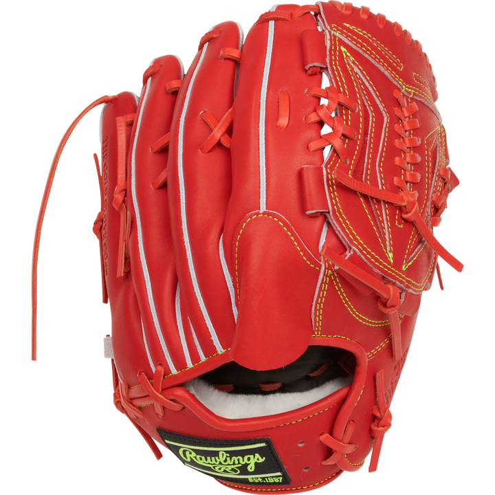 A Rawlings Heart of the Hide 11.75" Japan Series Baseball Glove (GR3HEA15MG) is displayed on a plain white background, featuring bright red leather with yellow stitching and white accents.