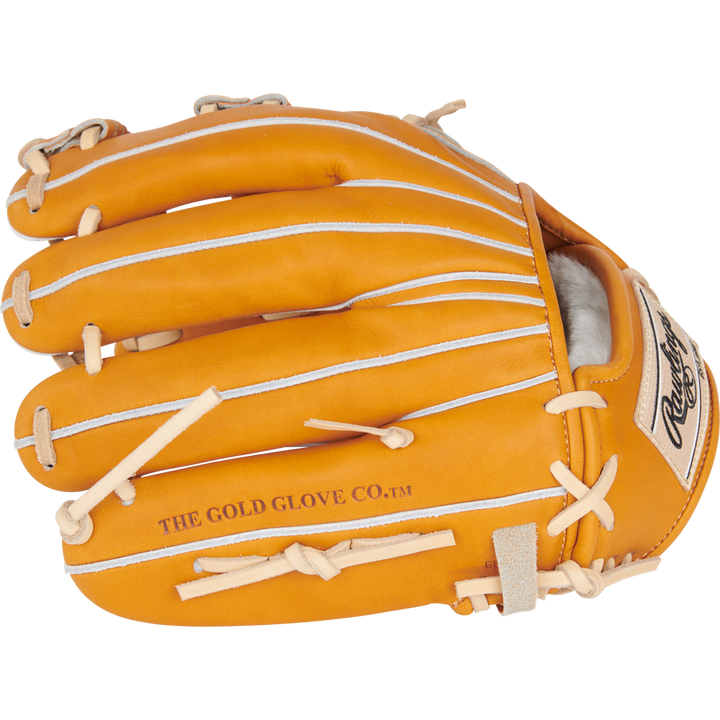 A tan Rawlings Heart of the Hide 11.5" Japan Series GR3HECK4MG baseball glove made from premium steerhide, featuring white laces and "THE GOLD GLOVE CO." on the side, is shown from above with fingers closed.