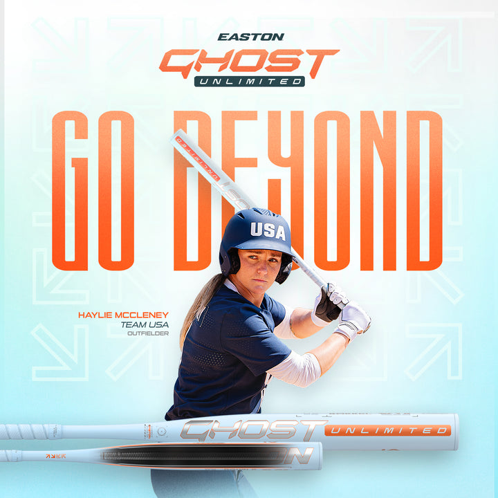 A softball player in a navy USA uniform readies her swing with a 2025 Easton Ghost Unlimited (-9) Fastpitch Softball Bat. Bold orange "GO BEYOND" text appears behind her, with the Easton bat displayed at the bottom of the image.