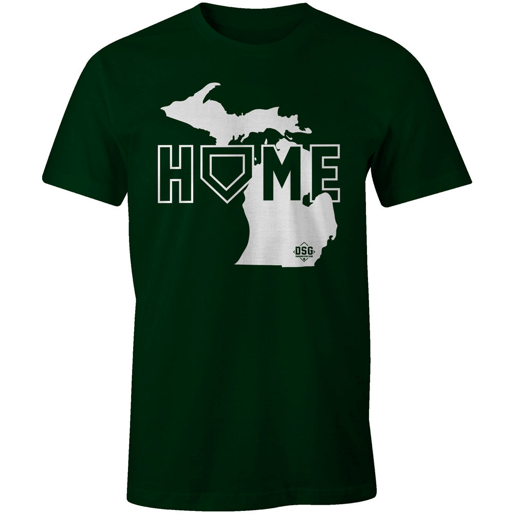 The DSG Apparel Home (Michigan) T-Shirt (DSG-HOME-MI) by DSG Apparel features a dark green classic fit with โHOMEโ in white, the O replaced by a home plate symbol inside an outline of Michigan. Made from soft, moisture-wicking cotton.