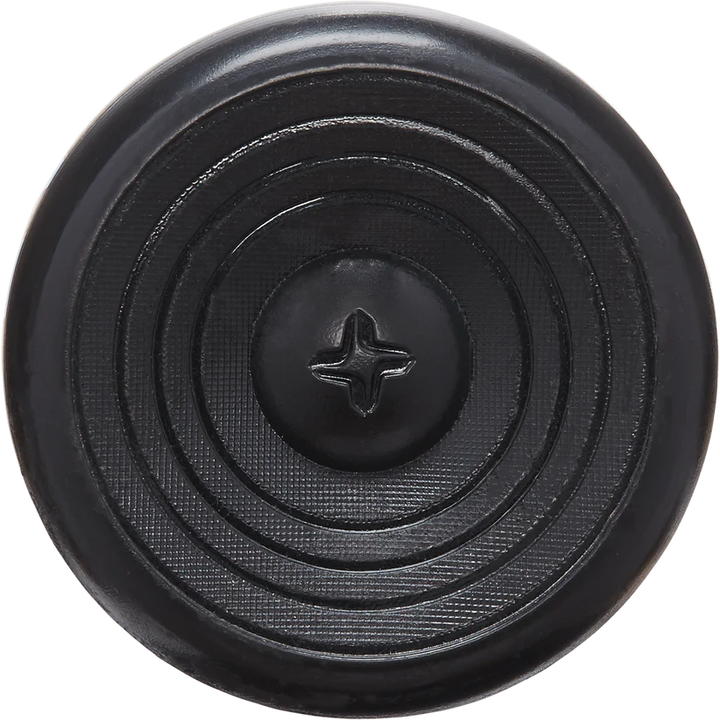 Close-up of a black, round button with concentric circles and textured surface, featuring a four-hole cross center—echoing the flared handle design of the 2025 AXE Avenge Pro 3 Hybrid (-3) BBCOR Baseball Bat (L130M-FLR) by AXE.