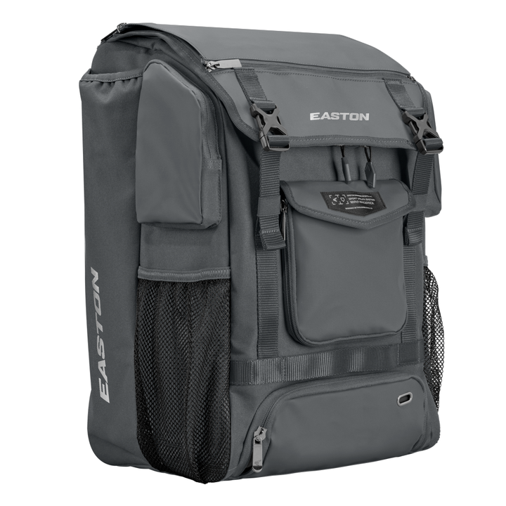 The Easton MAV1 Backpack (MAV1BP) is a gray, high-capacity gear bag with multiple zippered compartments, mesh side pockets, and a top flap closure, shown against a white background.