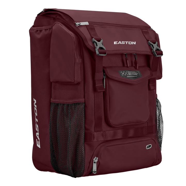 The Easton MAV1 Backpack: MAV1BP is a maroon gear bag with black straps, offering high-capacity storage and designed for baseball players.