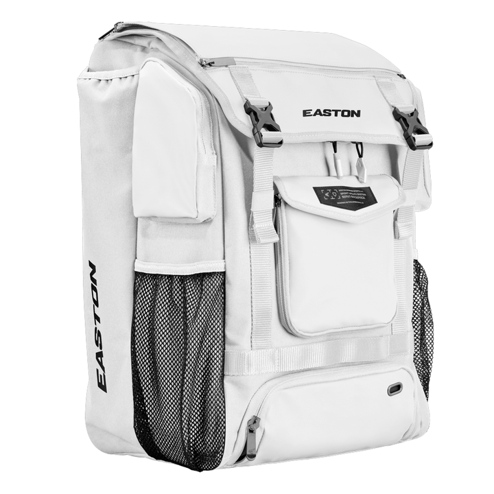 The Easton MAV1 Backpack (MAV1BP) features multiple compartments, mesh side pockets, black zippers and buckles, and the Easton logo on the front and side. This spacious gear bag stands upright on a plain white background.