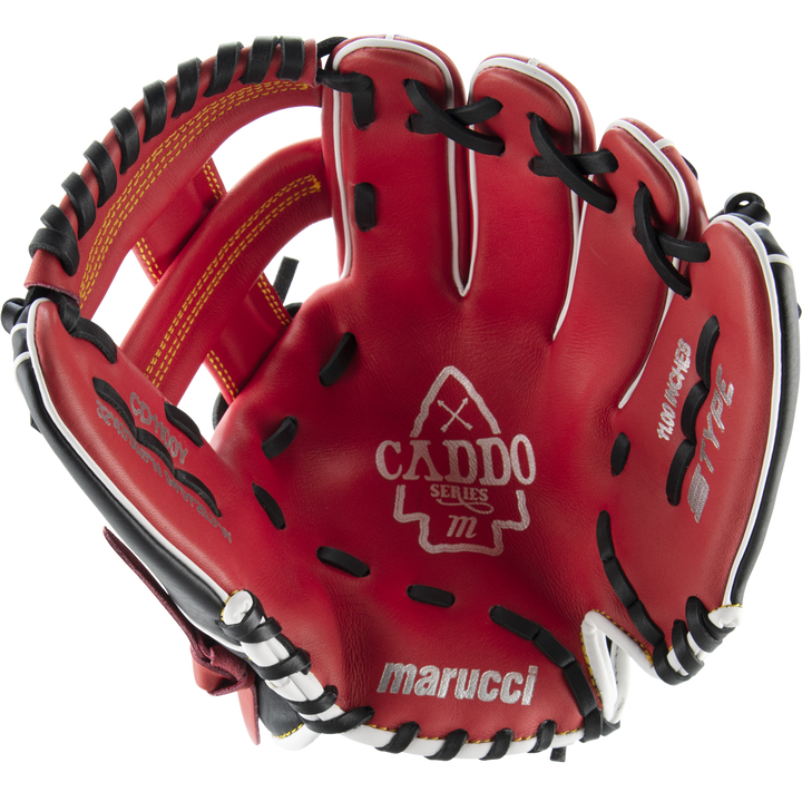 The Marucci Caddo 11" Baseball Glove (MFG2CD1100) is a red youth glove made from full-grain cowhide leather with black and white lacing and features the Marucci brand name and series logo on the palm.