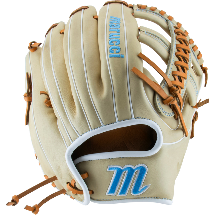 The Marucci Acadia 45A5 12" Fastpitch Glove (MFG3AC45A5FP-CM) features a beige design with tan laces, blue embroidered accents, and the Marucci logo, plus a braided post web—displayed against a white background.