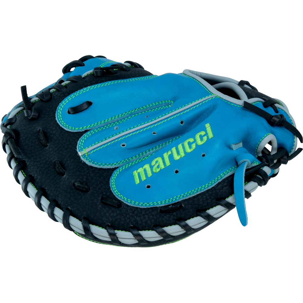 The Marucci Caddo 31" Baseball Catcher's Mitt (MFG3CD310-SB/BK) combines blue and black full-grain cowhide leather with green stitching and the Marucci logo, offering durability and style for catchers.