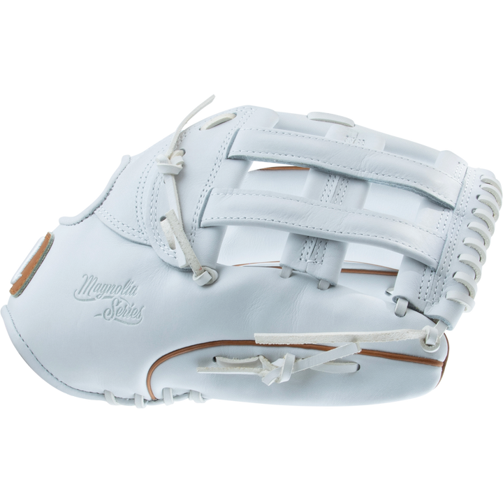 The Marucci Magnolia 78R3 12.75" Fastpitch Glove features white Japanese-tanned steerhide leather with tan accents, an H-Web design, and the Magnolia Series logo embossed on the side.