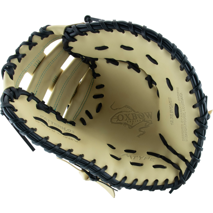 A close-up of the Marucci Oxbow 38S1 12.75" First Base Mitt, crafted from full-grain cowhide leather with pro-grade rawhide laces.