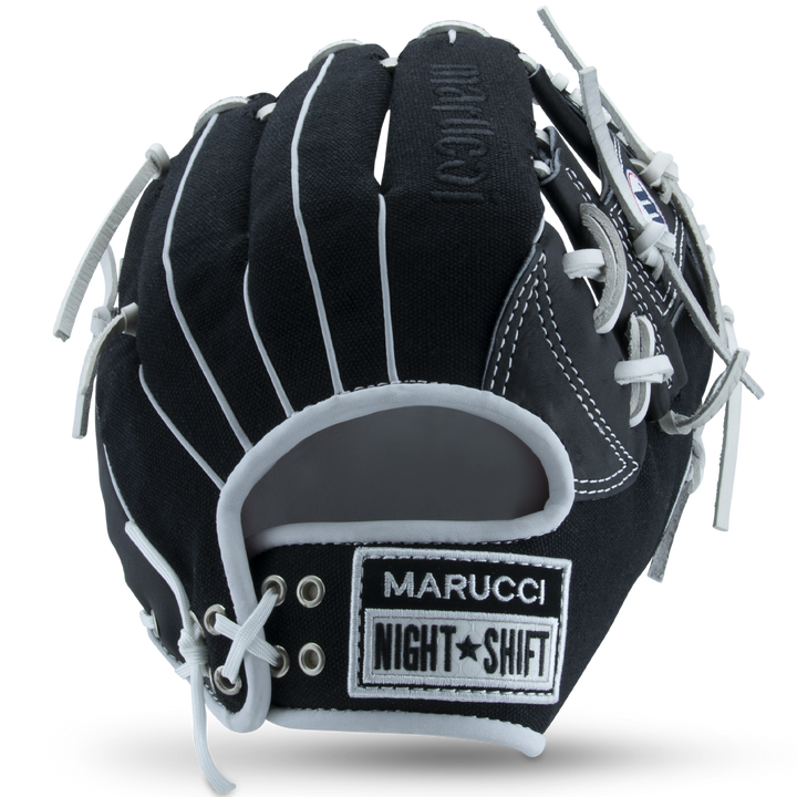 The Marucci NightShift CHUCK T 11.5" Baseball Glove (MFGNTSHFT-0103), with white laces and stitching plus MARUCCI and NIGHT SHIFT patches on the wrist, is shown against a plain white background—a standout for any Glove Cowboy’s collection.