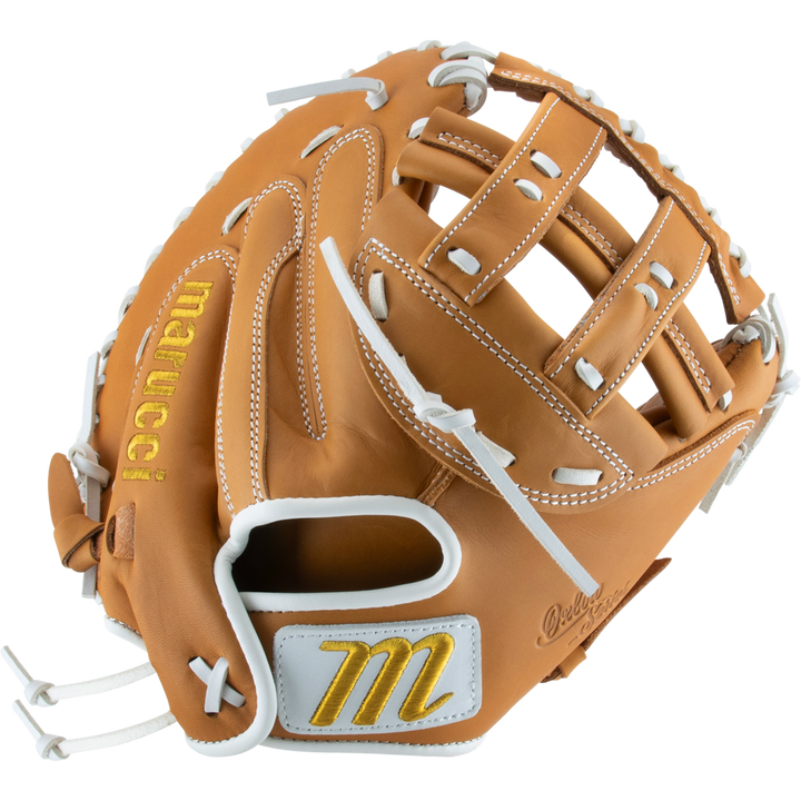 The Marucci Oxbow 240C2FP 33" Fastpitch Catcher's Mitt (MFGOX230C2FP-TF) features tan full-grain cowhide leather, white laces, gold stitching, and the Marucci logo on the wrist strap. Shown open from an angled top view.