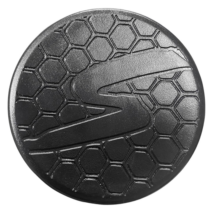 The 2024 Stinger Missile S (-3) BBCOR Baseball Bat by Stinger Sports features a black circle with a hexagon pattern, inspired by balanced swing weight and vibration-reducing technology.