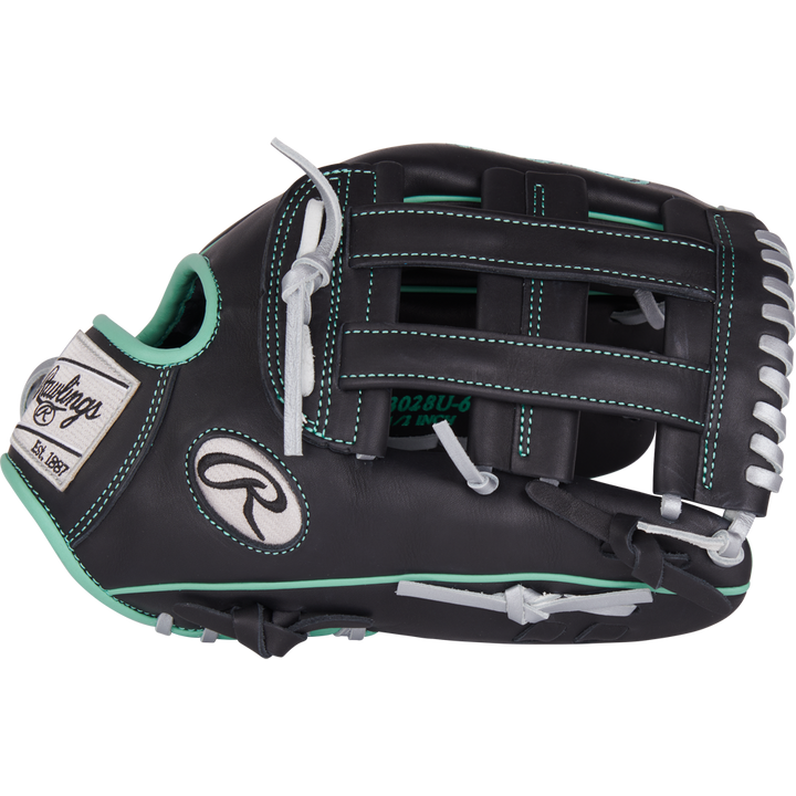 The Rawlings NXT 12.5" Baseball Glove (NXT3028U-6B) is black with mint green accents, white stitching, and laces, featuring a Pro-H web, the Rawlings logo, and a "Rawlings Est. 1887" patch.