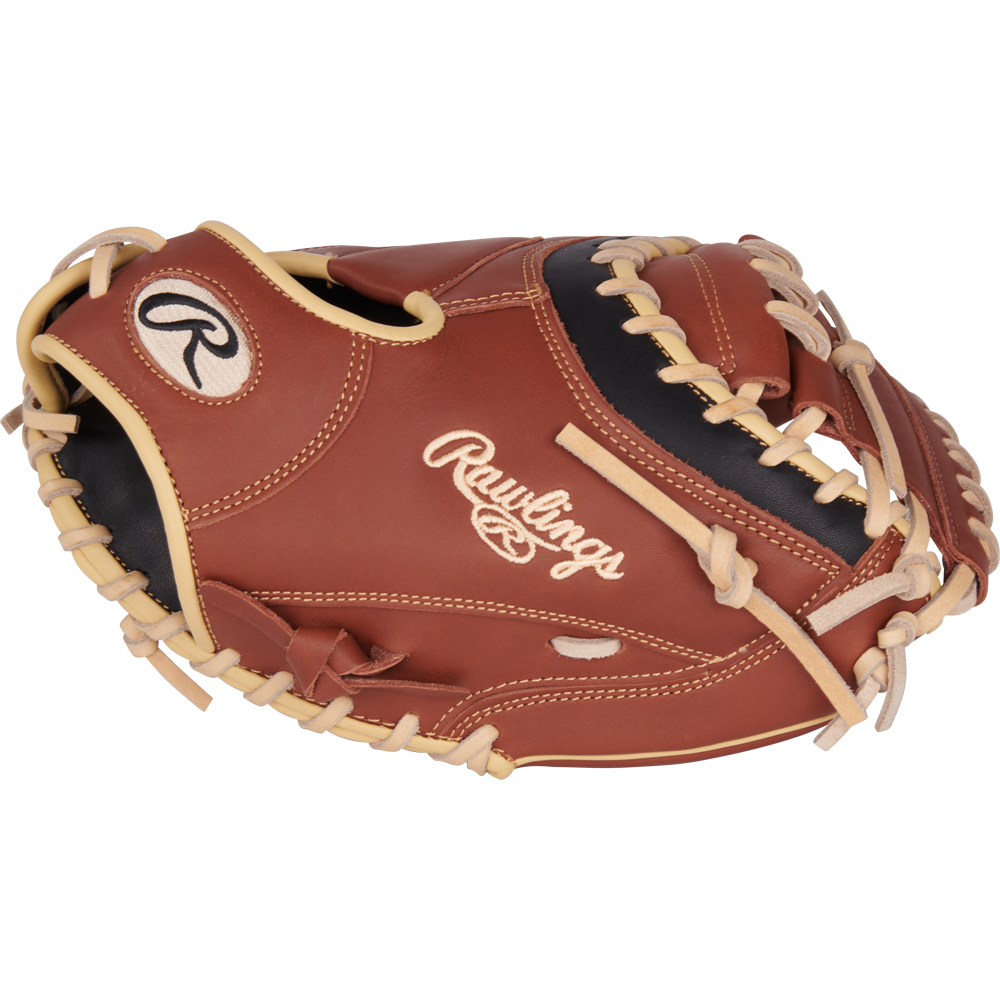 The Rawlings NXT 32.5" Baseball Catcher's Mitt (NXTCM325UDB) features a brown and black design with tan laces, ContoUR fit for comfort, and the stitched Rawlings logo.