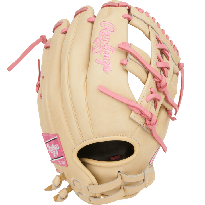 A Rawlings Heart of the Hide 12" Fastpitch Glove (PRO120SB-32CP) in tan with pink laces and pink Rawlings logos, for right-handed throwers, is shown against a white background.