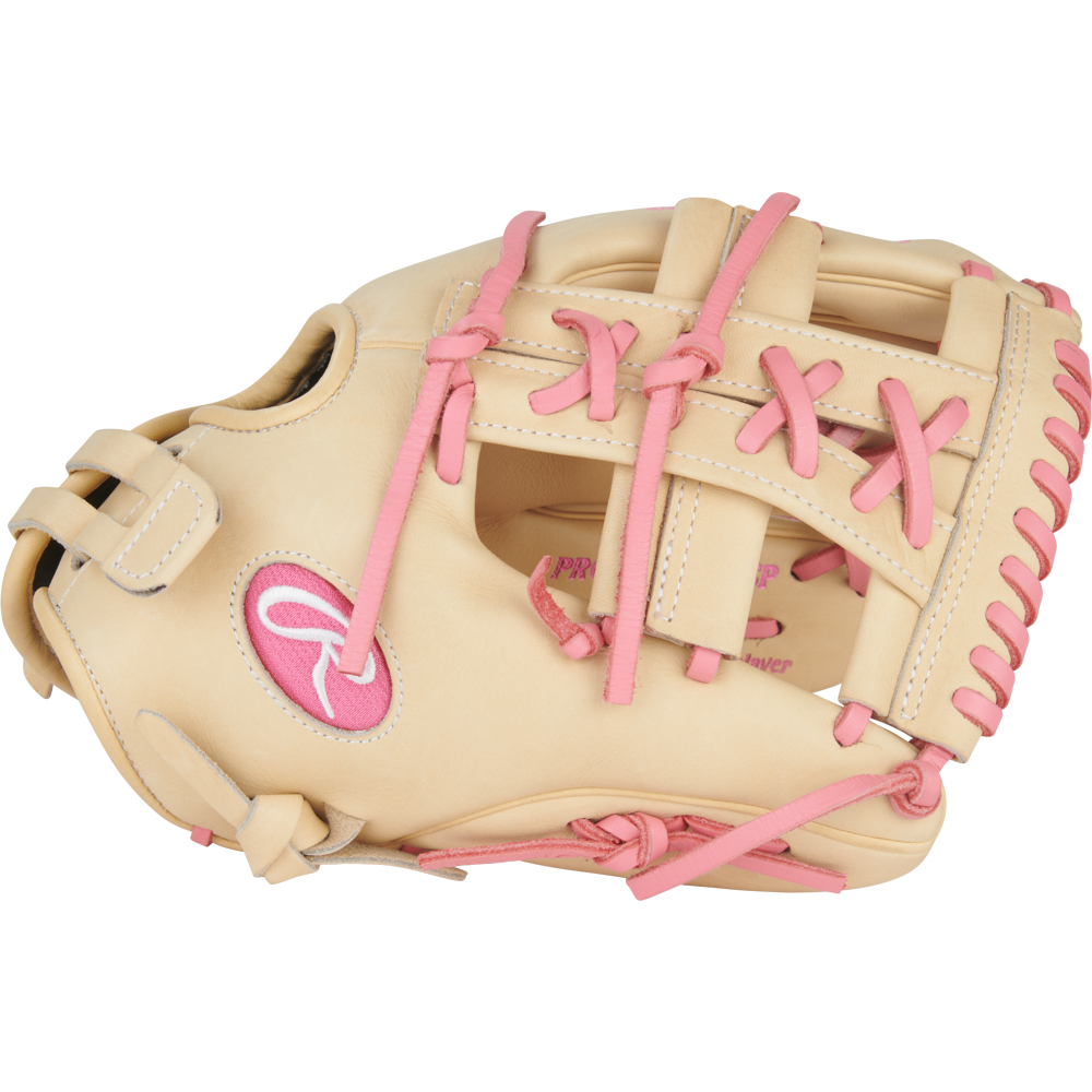 The Rawlings Heart of the Hide 12" Fastpitch Glove (PRO120SB-32CP) features a tan design with pink laces, stitching, and logoâdelivering style and performance for fastpitch players.