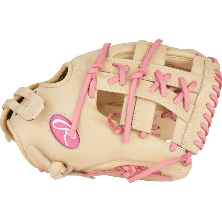 The Rawlings Heart of the Hide 12" Fastpitch Glove (PRO120SB-32CP) features a tan design with pink laces, stitching, and logoâdelivering style and performance for fastpitch players.