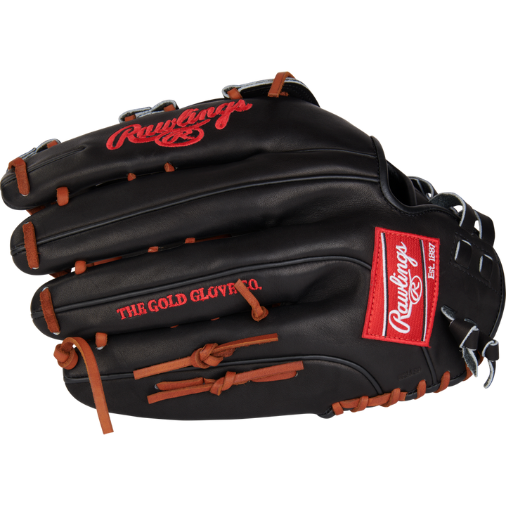 A Rawlings Heart of the Hide 14" slowpitch glove (RPRO140SP-6B) in black with brown laces and red Rawlings logos, including "THE GOLD GLOVE CO." stitched on the side, is pictured palm-down on a white background.