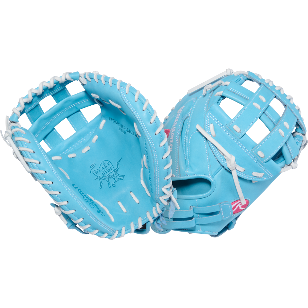 A Rawlings Heart of the Hide 34" Fastpitch Catcher's Mitt (PROCM34FP-24CBW) in bright blue with white lacing and stitching is displayed side by side to show both palm and back against a plain light background.