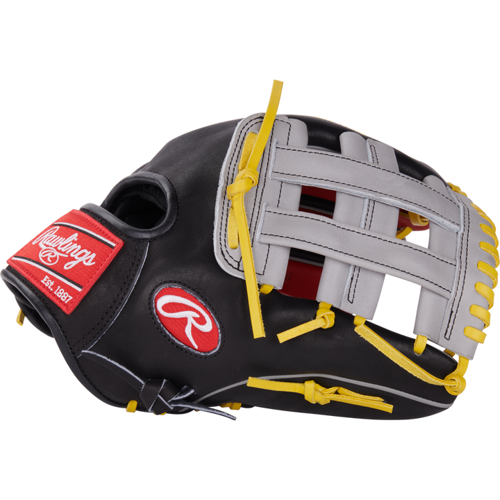 The Rawlings Heart of the Hide 12.25" Baseball Glove (PROKB17SB) features a black and gray design with yellow laces, red Rawlings logo patch, and basket-weave web, shown on a plain white background.