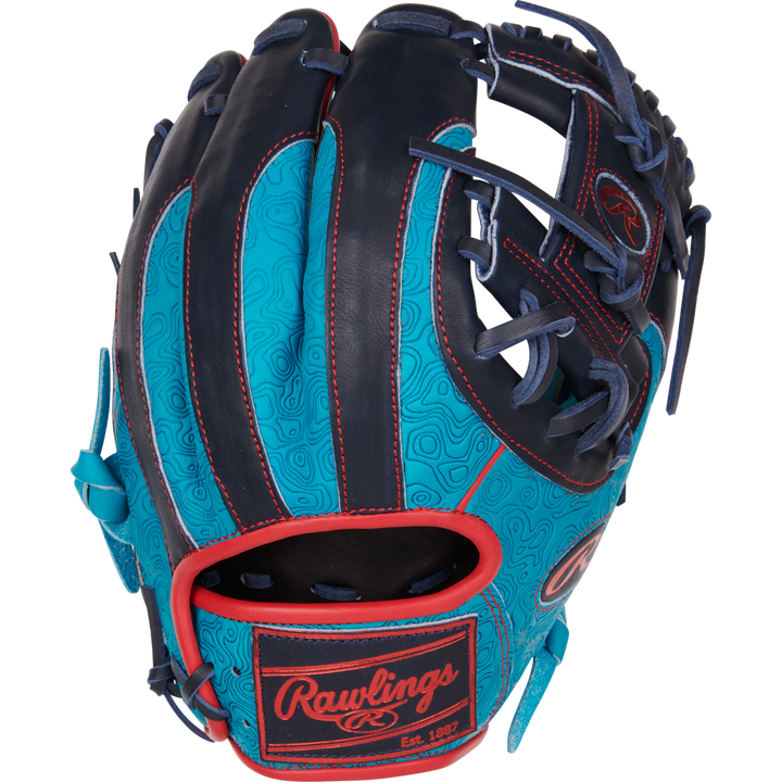 The Rawlings Heart of the Hide 11.5" Color Sync Baseball Glove (PROR204-2TE) features turquoise and navy leather with red trim, swirl patterns, and dark laces, displayed on a white background.