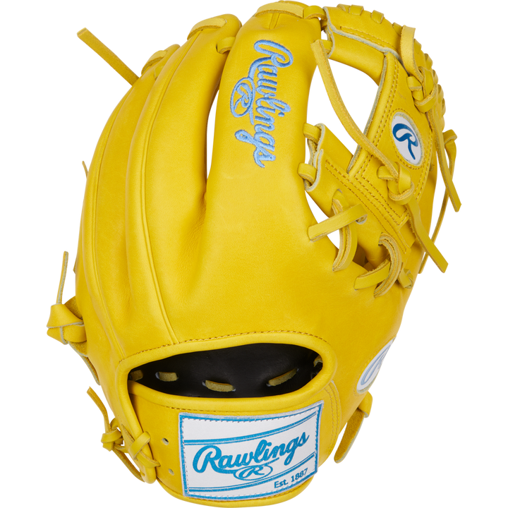 The Rawlings Heart of the Hide 11.5" Color Sync Baseball Glove (PROR204-2Y) features a bright yellow design, blue Rawlings logos and stitching, an open web, and an adjustable wrist strap for infield use.
