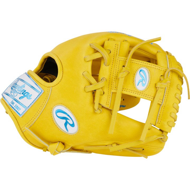 The Rawlings Heart of the Hide 11.5" Color Sync Baseball Glove (PROR204-2Y) features a bright yellow design with blue and white Rawlings logos, visible laces, and an open web, displayed on a plain white background.