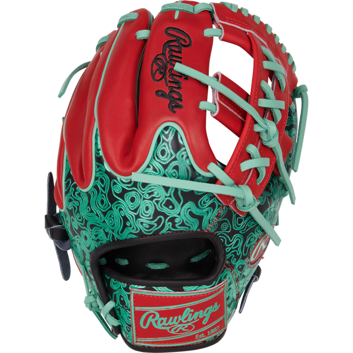 The Rawlings Heart of the Hide 11.5" Color Sync Baseball Glove (PROR204W-32BS) features red and teal colors, teal laces, stylish teal and black patterns, and signature Rawlings branding on the wrist strap and back.