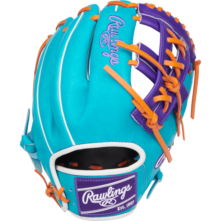 The Rawlings Heart of the Hide 11.75" Baseball Glove (PROR205-32TEP) features turquoise and purple leather, orange laces, white stitching, and signature logos—ideal for top infield performance.