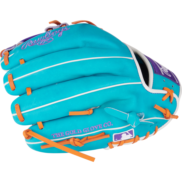 The Rawlings Heart of the Hide 11.75" Baseball Glove (PROR205-32TEP) features turquoise leather, orange laces, white piping, purple branding, The Gold Glove Co., and an MLB logo on the side.