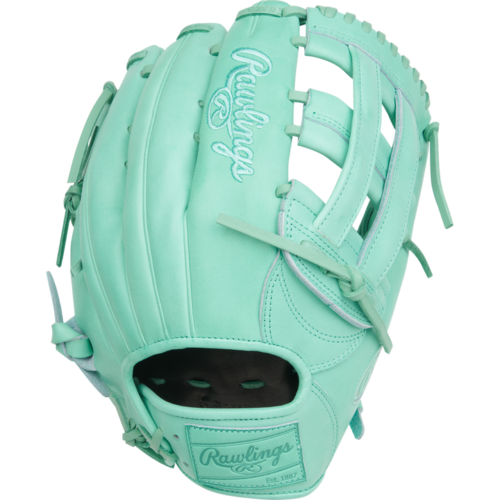 The Rawlings Heart of the Hide 12.75" Baseball Glove (PROR3039-6M) features a mint green design with light blue stitching and laced webbing, shown against a plain white background.