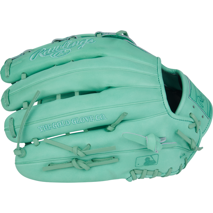 The Rawlings Heart of the Hide 12.75" Baseball Glove (PROR3039-6M) features turquoise leather, visible stitching and laces, "THE GOLD GLOVE CO." embossing, and a 12.75-inch design for superior reach and performance.