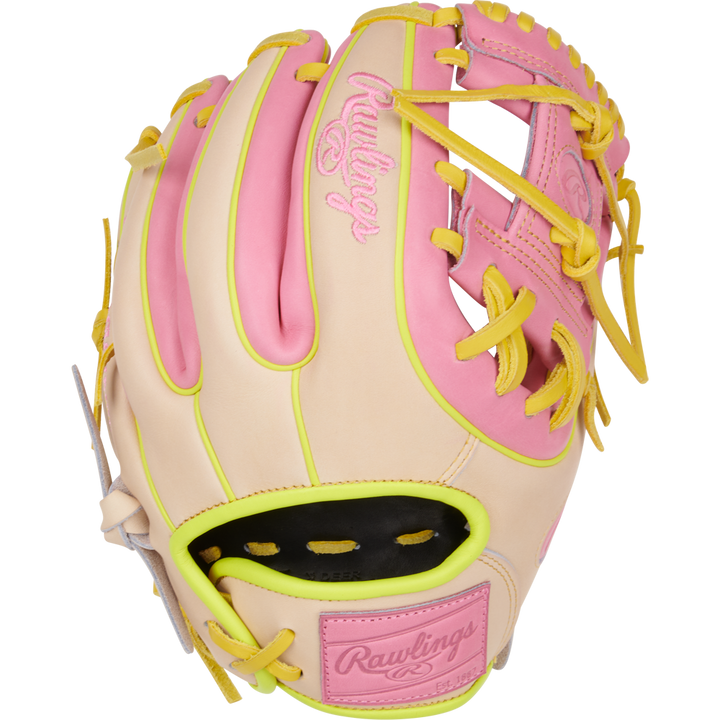 The Rawlings Heart of the Hide 11.25" Color Sync Baseball Glove (PROR312U-2P) features beige, pink, and yellow leather with pink stitching, a pink logo, yellow laces and trim, an open web design, and exclusive Color Sync details for added style.
