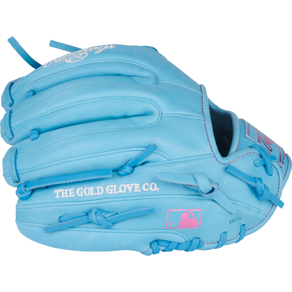 The Rawlings Heart of the Hide 11.5" Baseball Glove (PROR314-2CBCB) features sky blue leather, pink stitching, "THE GOLD GLOVE CO." text, a pink MLB logo, and is part of Rawlings' famous Heart of the Hide series.